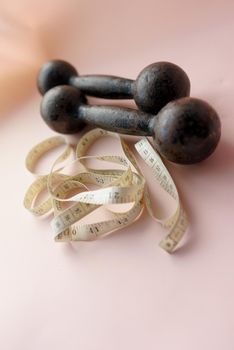 Diet Concept Slimming with Exercise, Black Drumbell on Floor, Fitness Sports