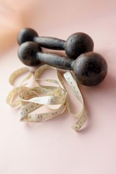 Diet Concept Slimming with Exercise, Black Drumbell on Floor, Fitness Sports