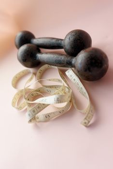 Diet Concept Slimming with Exercise, Black Drumbell on Floor, Fitness Sports