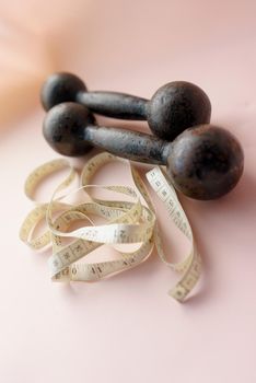 Diet Concept Slimming with Exercise, Black Drumbell on Floor, Fitness Sports