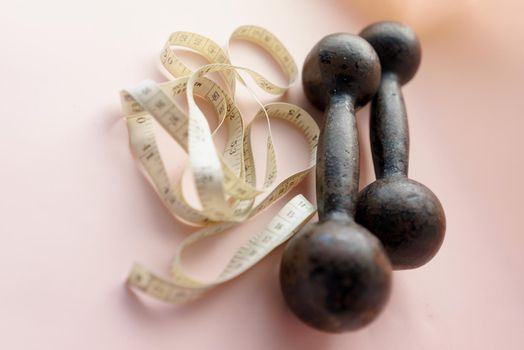 Diet Concept Slimming with Exercise, Black Drumbell on Floor, Fitness Sports
