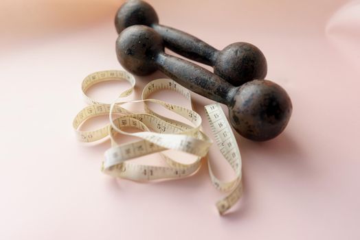 Diet Concept Slimming with Exercise, Black Drumbell on Floor, Fitness Sports