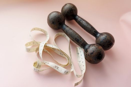 Diet Concept Slimming with Exercise, Black Drumbell on Floor, Fitness Sports