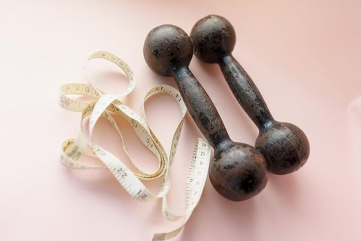 Diet Concept Slimming with Exercise, Black Drumbell on Floor, Fitness Sports