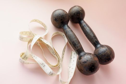 Diet Concept Slimming with Exercise, Black Drumbell on Floor, Fitness Sports