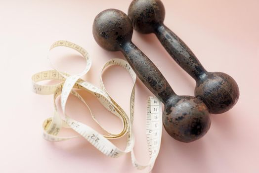 Diet Concept Slimming with Exercise, Black Drumbell on Floor, Fitness Sports