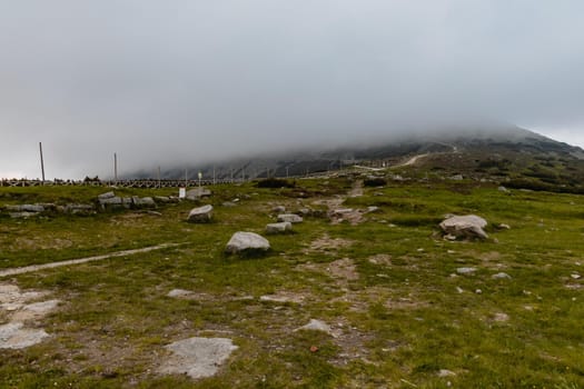 Long mountain trail with panorama of Karkonosze Giant Mountains around