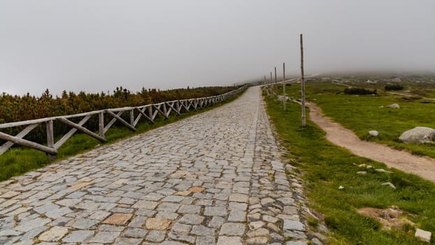 Long mountain trail with panorama of Karkonosze Giant Mountains around