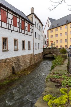 Historic buildings and Erft river in Bad Muenstereifel, Germany