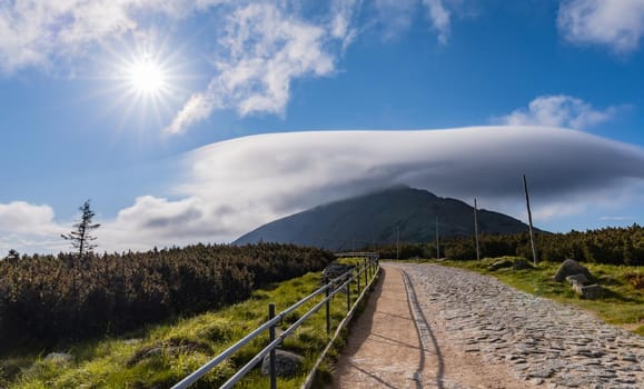 Long mountain trail with panorama of Karkonosze Giant Mountains around