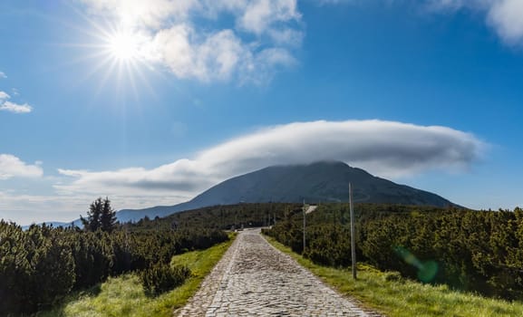 Long mountain trail with panorama of Karkonosze Giant Mountains around