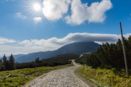 Long mountain trail with panorama of Karkonosze Giant Mountains around