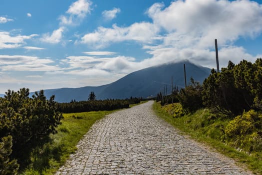 Long mountain trail with panorama of Karkonosze Giant Mountains around