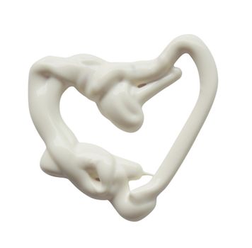 Heart shape made of white cream on a white background, can be used as mayonnaise too. Clipping Path included