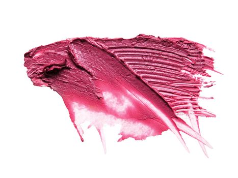 close up of a smudged lipstick on white background