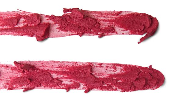 close up of a smudged lipstick on white background