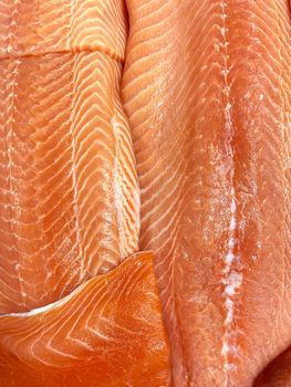 Salmon raw meat in a butcher shop, top view