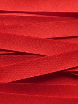 Shiny red satin ribbon background