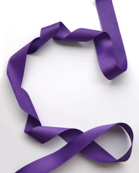 Purple ribbon over white background, design element. Clipping Path included