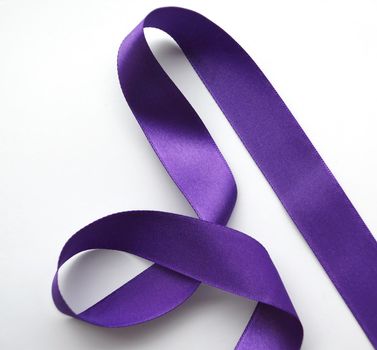 Purple ribbon over white background, design element. Clipping Path included