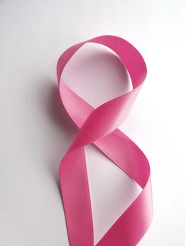 Pink ribbon against cancer isolated on white background. Clipping Path included