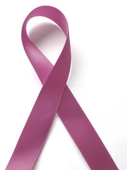 Pink ribbon against cancer isolated on white background. Clipping Path included