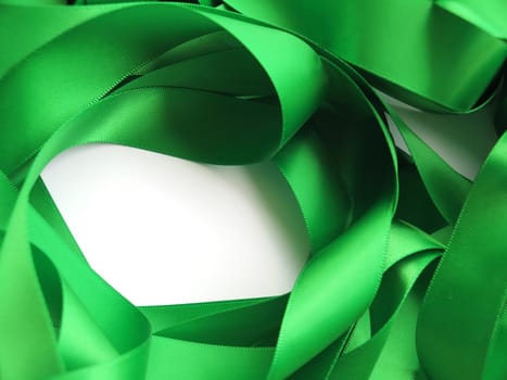 Green ribbon over white background, design element. Clipping Path included