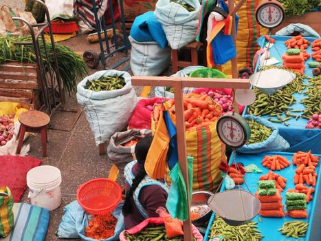 Women in the market in Urubamba in the Sacred Valley near Machu Picchu, Cusco Region, Peru