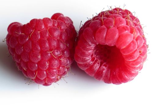 beautiful ripe raspberries on white background