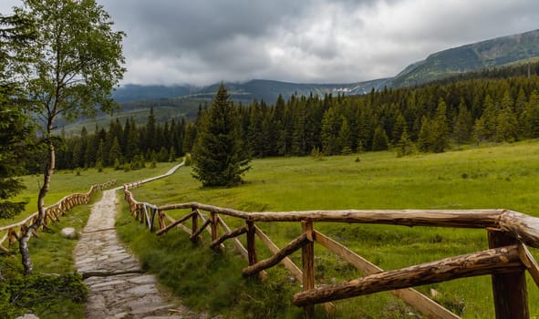 Long mountain trail with panorama of Karkonosze Giant Mountains around