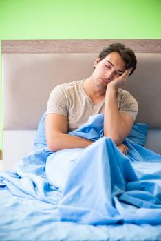 Man having trouble with his sleep