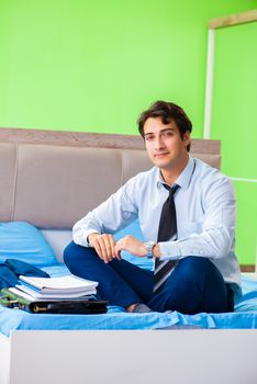 Businessman working in the hotel room