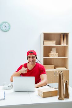 Call center worker at parcel distribution center in post office