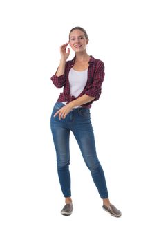 Full length portrait of pretty young beautiful woman whispering or calling out to someone, talking gossip, isolated on white background, casual people