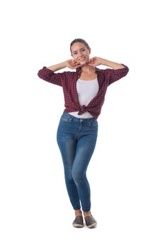 Full length portrait of smiling young woman posing dancing isolated on white background, casual people