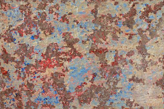 shabby peeled white, blue and red paint layers on concrete surface - flat background and texture.