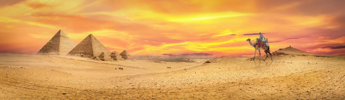 Colorful sunset over the pyramids in Giza, Egypt