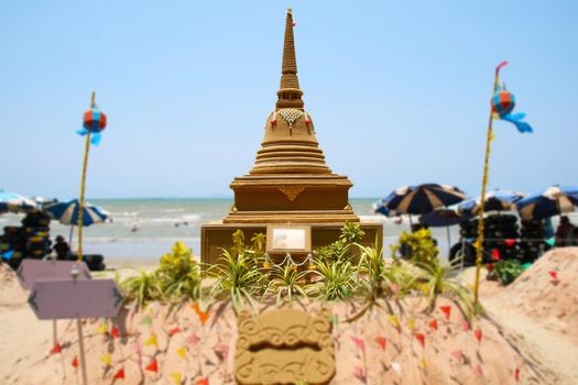 sand pagoda in Songkran festival represents In order to take the sand scraps attached to the feet from the temple to return the temple in the shape of a sand pagoda