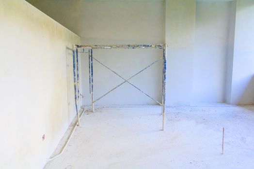 interior in construction and wall decoration at building site