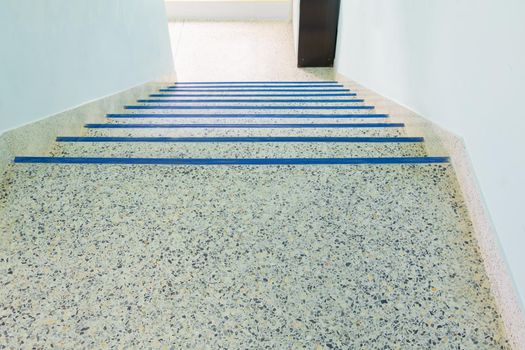 stairs walkway down terrazzo floor. select focus with shallow depth of field