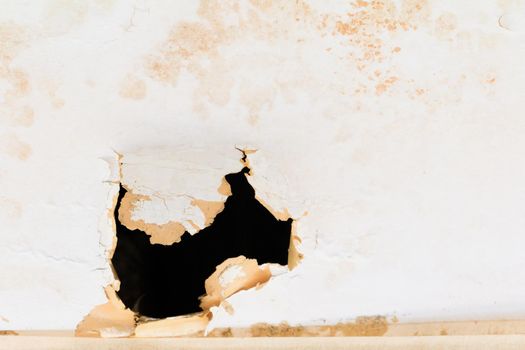 gypsum ceiling inside damaged by water leaking