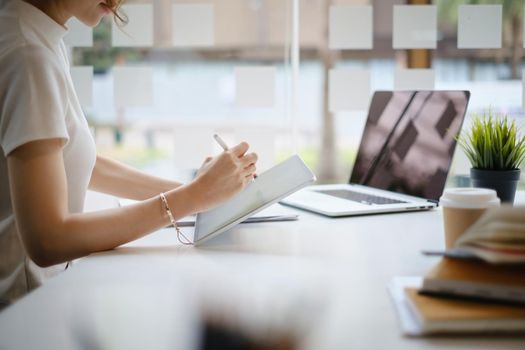 User experience concept. Creative Web Designer sketching application and developing template layout on laptop, framework for digital devices