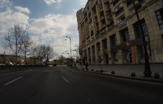 Changes and complications caused by coronavirus epidemy, world without crowds, virus empties streets. No traffic jam, no pollution, empty streets in downtown Bucharest, Romania, 2020