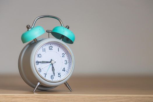 Retro styled white alarm clock, isolated and copy space,