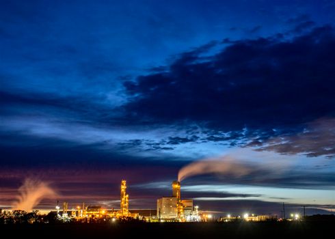 Ominous Storm Clouds Prairie night refinery Fertilizer
