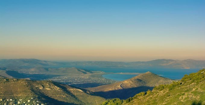 Panoramic photo of beach near Nea Makri as seen from Penteli mountain at the evening, Attica, Greece