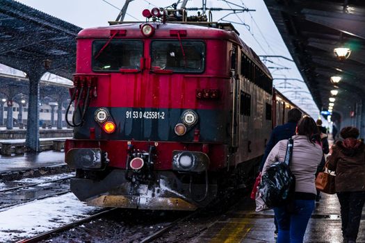 Winter detail train view. Train on the platform of Bucharest North Railway Station (Gara de Nord Bucuresti) in Bucharest, Romania, 2021