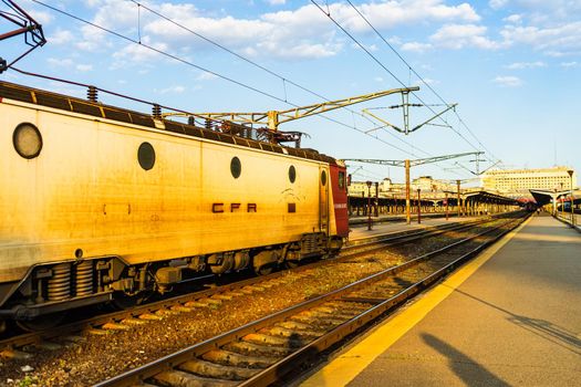 Detail of train in motion at train platform at Bucharest North Railway Station (Gara de Nord Bucharest) in Bucharest, Romania, 2020