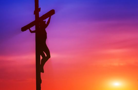 Crucifixion of Jesus Christ at sunset