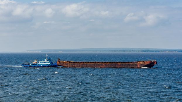 Blue cargo ship on the Volga river